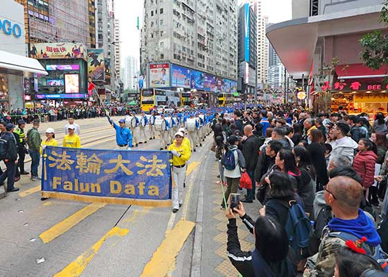 Image for article Гонконг. Марш и митинг, посвящённые Дню прав человека, привлекают внимание к преследованию в материковом Китае  