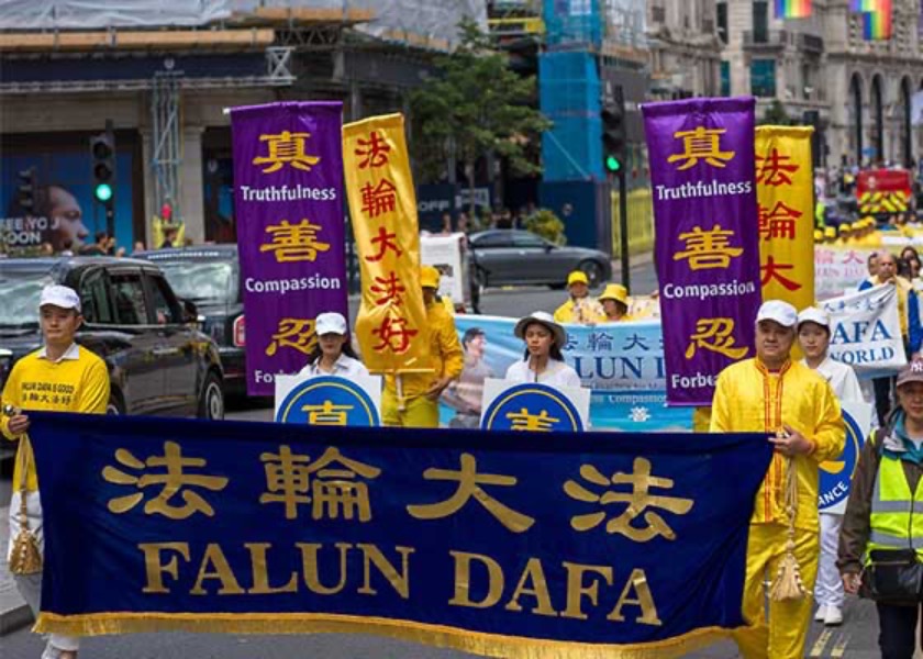 Image for article Лондон, Великобритания. Шествие и пресс-конференция в знак протеста против 24-летнего преследования Фалунь Дафа в Китае