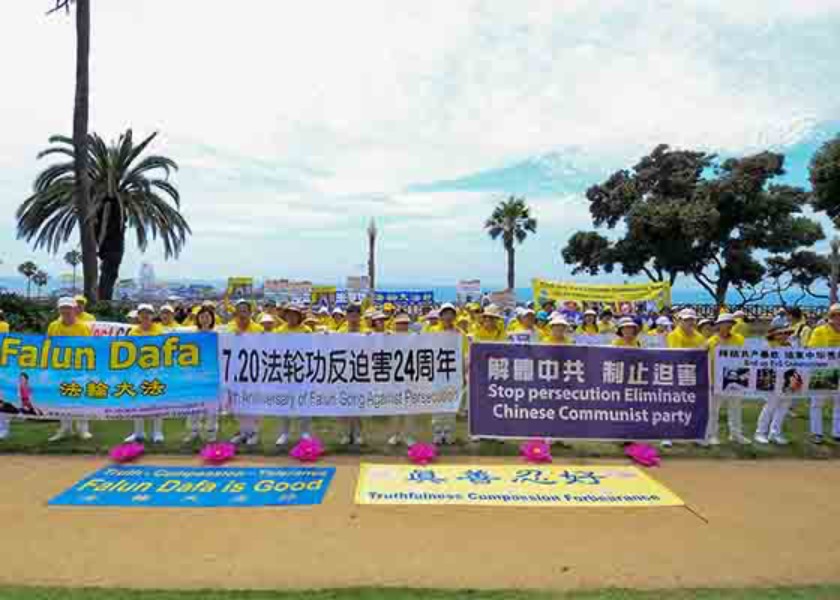 Image for article Лос-Анджелес, США. Мероприятие на пляже в Санта-Монике информирует людей о преследовании в Китае