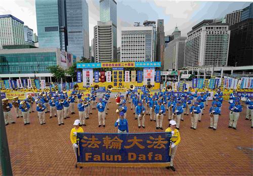 Image for article Гонконг. Митинг и парад практикующих Фалуньгун призывают привлечь виновных в преследовании к правосудию