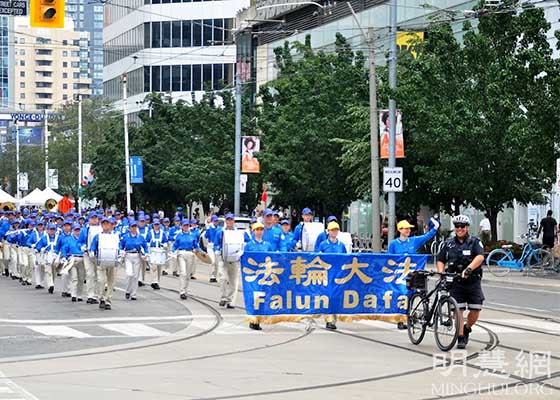Image for article Канада. Парад Фалунь Дафа в Торонто: «Пробуждайтесь, отвергайте КПК и приветствуйте светлое будущее»