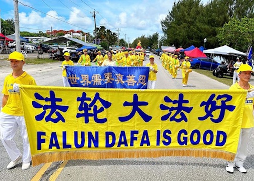 Image for article Сайпан, США. Практикующие Фалунь Дафа приняли участие в параде в честь Дня независимости