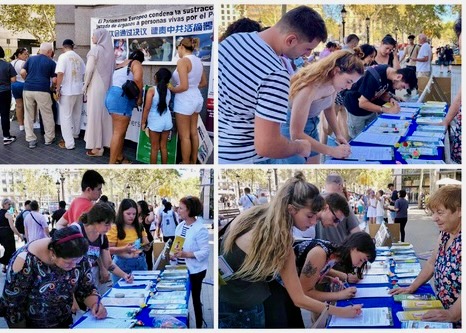 Image for article Барселона, Испания. Люди подписывают петицию с призывом положить конец преследованию Фалуньгун