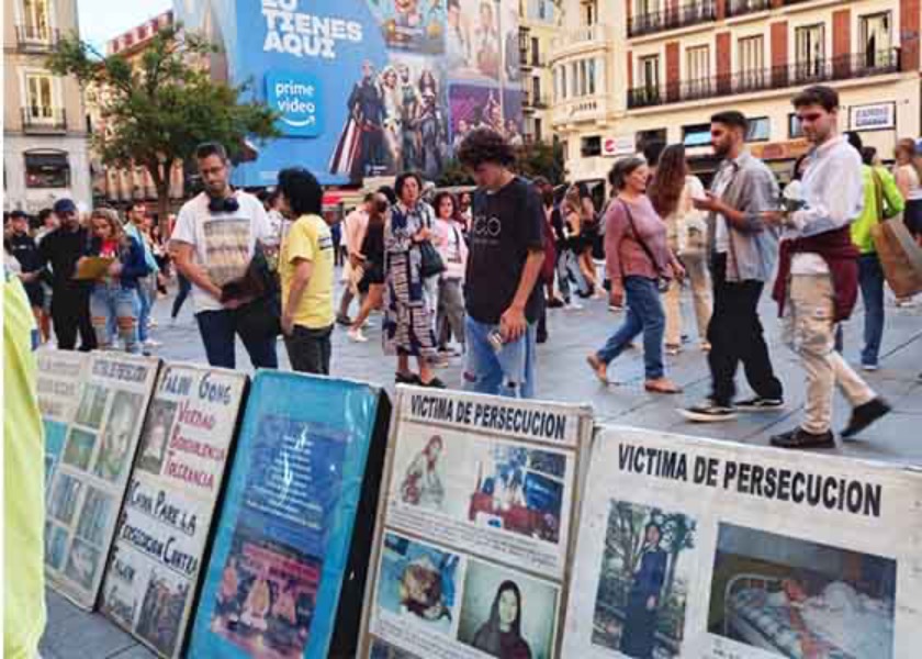 Image for article Испания. Практикующие провели мероприятие в центре Мадрида, разоблачая преследование Фалунь Дафа в Китае
