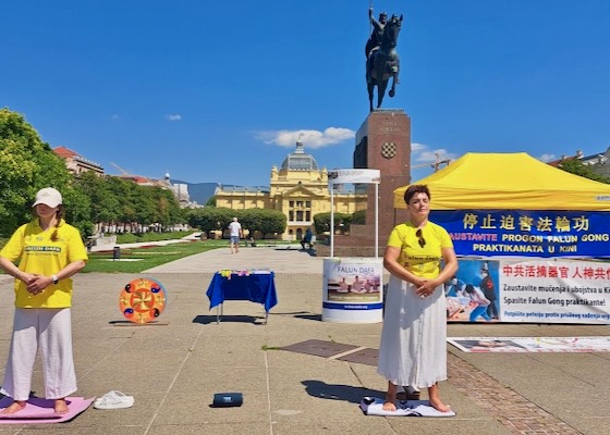 Image for article Хорватия. Люди поддерживают практикующих во время митинга, призывающего прекратить преследование