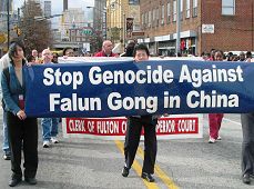 Image for article Джорджия, США: Практикующие Фалуньгун разоблачаютпреследования во время праздника, посвященного Дню Мартина ЛютераКинга (фотографии)